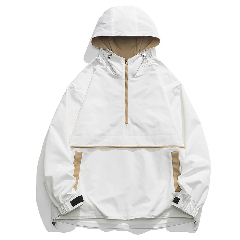 Paar windjacks met halve rits en capuchon in hiphopstijl